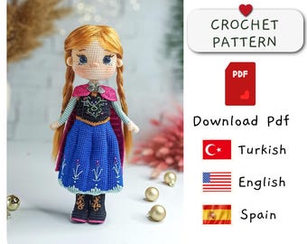 May include: Crochet pattern for a doll with red hair, a blue dress, and a pink cape. The pattern is available in Turkish, English, and Spanish. Download PDF.