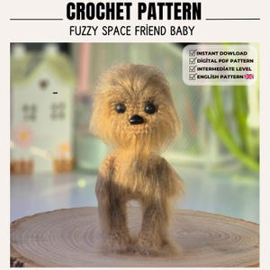 May include: A crochet pattern for a fuzzy space friend baby. The text reads CROCHET PATTERN FUZZY SPACE FRIEND BABY, INSTANT DOWLOAD, DIGITAL PDF PATTERN, INTERMEDIATE LEVEL, and ENGLISH PATTERN. The image shows a small, tan, furry creature doll.