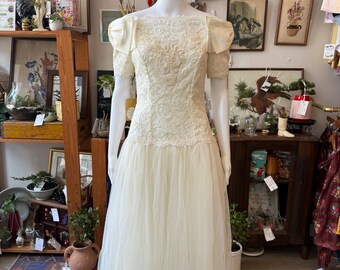 1980s Ivory Lace Beaded Bridal Gown with Tulle Skirt and Bow Shoulders