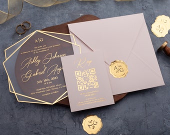 Custom gold foil wedding invitation set with blush pink accents and clear acrylic card