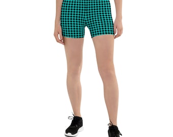 May include: Black and turquoise athletic shorts with a checkered pattern. The shorts are made of a stretchy, comfortable fabric and are perfect for working out or running errands.