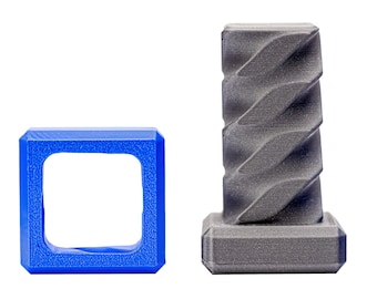 May include: A blue plastic square with a square hole in the center and a gray plastic object with a spiral design on top.