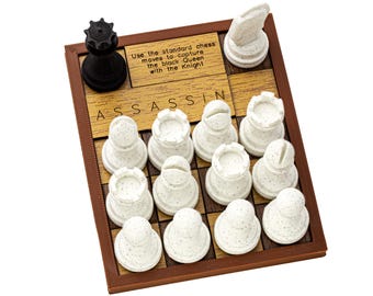 The Assassin puzzle. Capture the Black Queen with the White Knight.