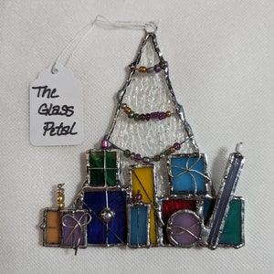 Christmas tree with presents stained glass ornament.