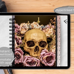 May include: A digital 2026 planner displayed on a tablet, featuring a skull surrounded by pink roses. The planner has hyperlinked tabs and the text "2026 Planner". Additional text includes "Instant download" and "Annotate with app".