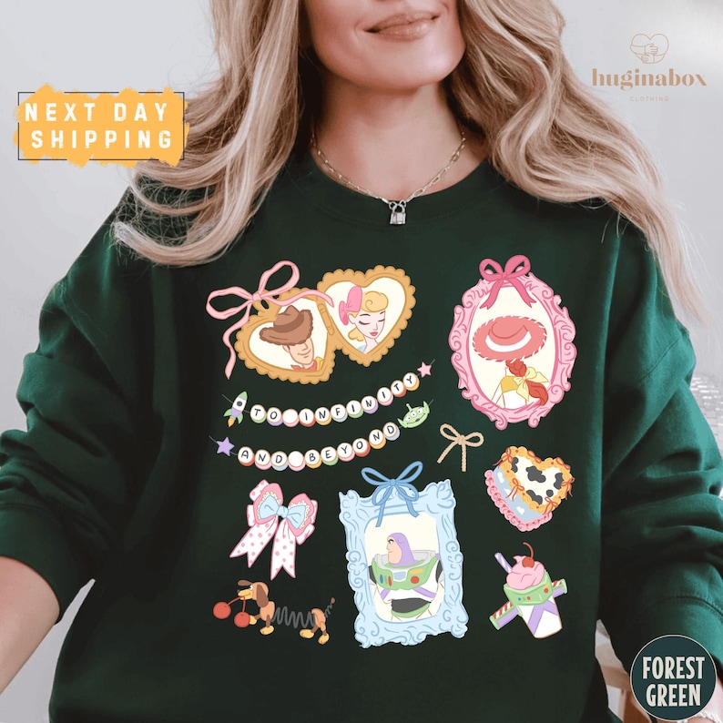 A woman wearing a green sweater with various cartoon-style illustrations and text on it.