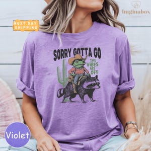 Sorry Gotta Go The Vibes Are Off Comfort Colors Shirt, Cowboy Frog and Raccoon Tee, Funny Western Trash Panda Meme Shirt