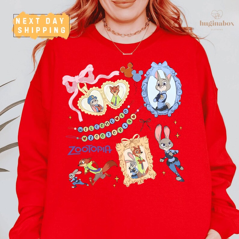 A person wearing a red sweater with various cartoon animal characters and text related to the character ZooTropolis.