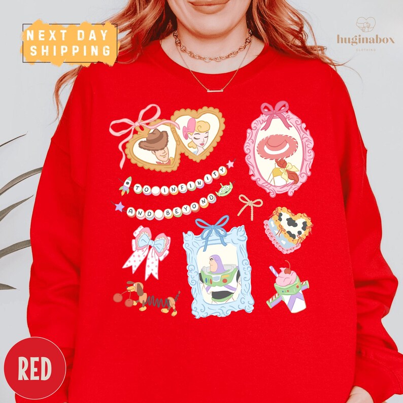 A person wearing a red sweater with various cartoon-style illustrations and text on it.