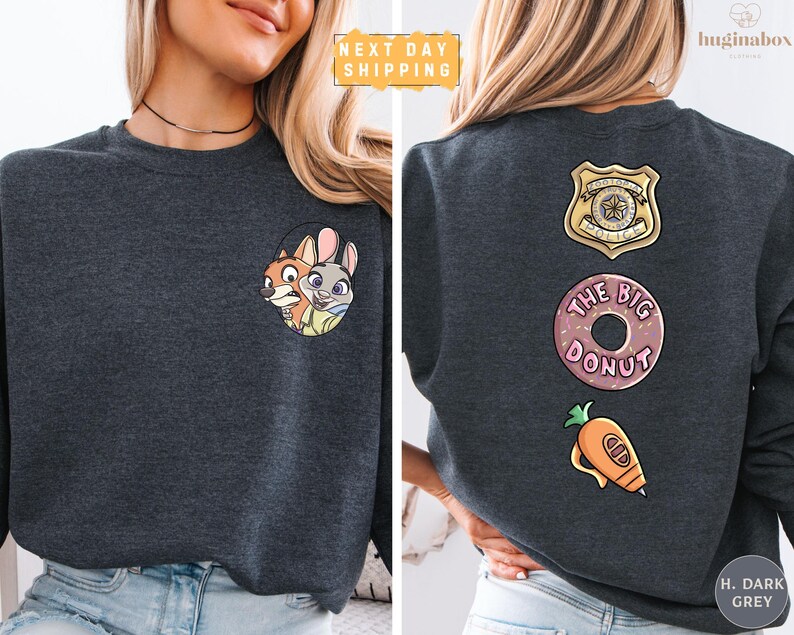 The image is a collage of two photos of a woman wearing a gray sweatshirt with various cartoon characters and logos on the back.