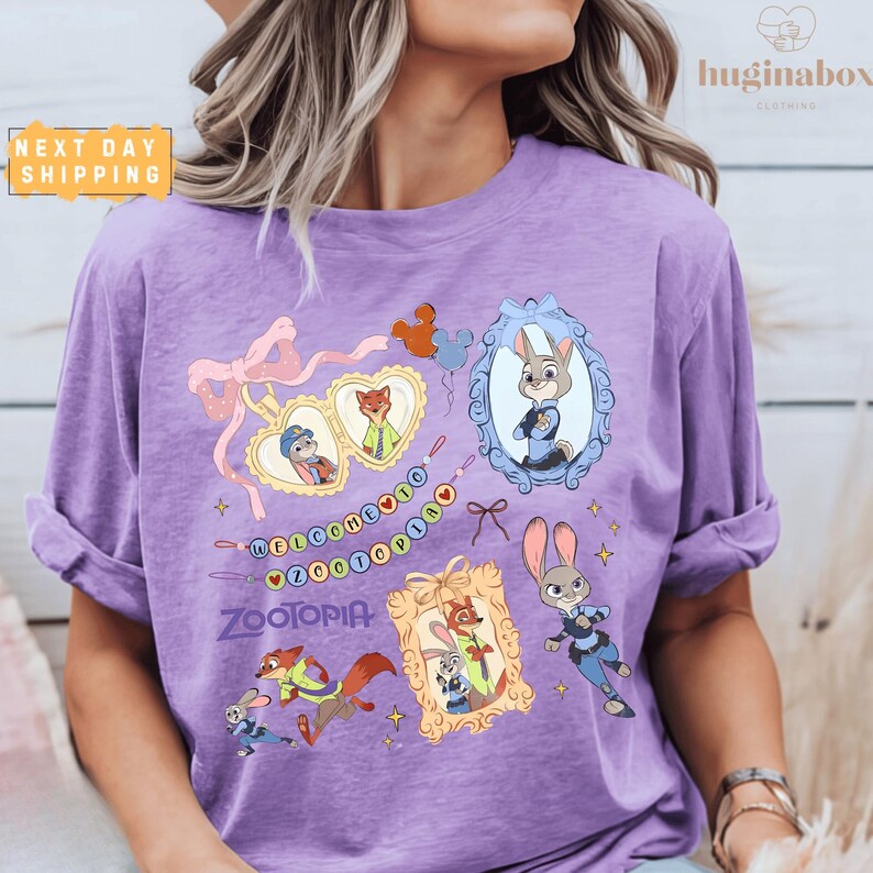 A woman wearing a purple t-shirt with various cartoon animal characters and a decorative frame.