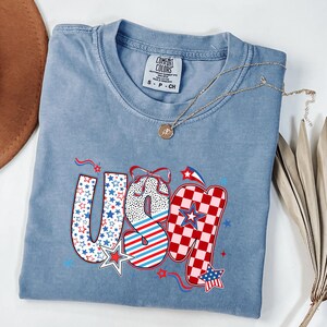 USA 4th Of July Comfort Colors Shirt For Women With Stars Stripes Floral Flag Design Red White And Blue Patriotic Summer Holiday Look