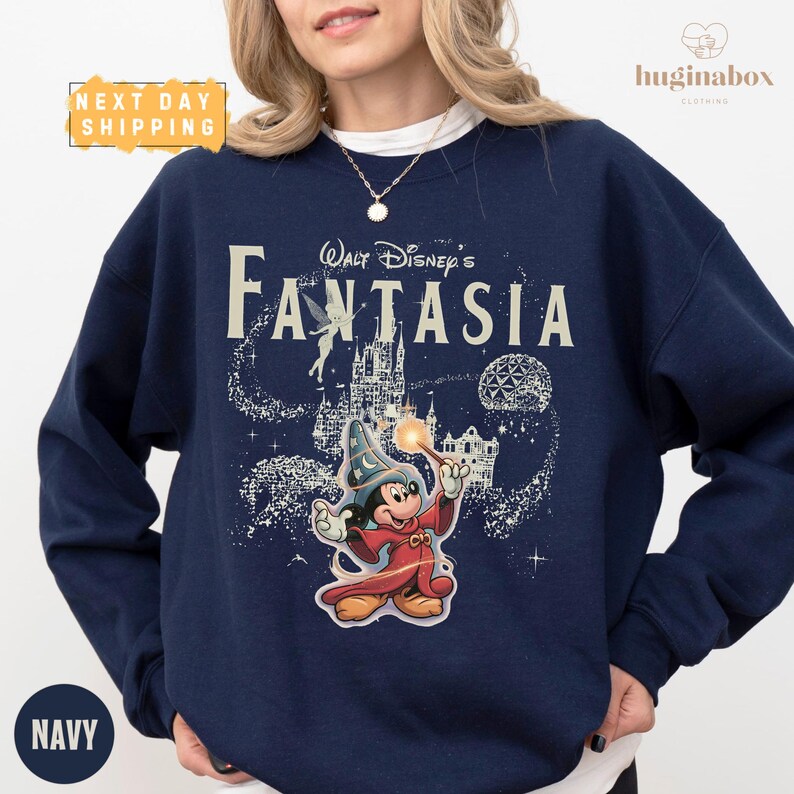 A navy blue sweatshirt with a Disney-themed graphic and text, including the character Mickey Mouse.