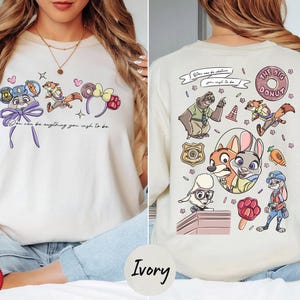 The image is a collage of two photos featuring a woman wearing a white t-shirt with a cartoon character design. The woman is sitting on a bed, and the t-shirt has a colorful and playful design with various cartoon characters and elements.