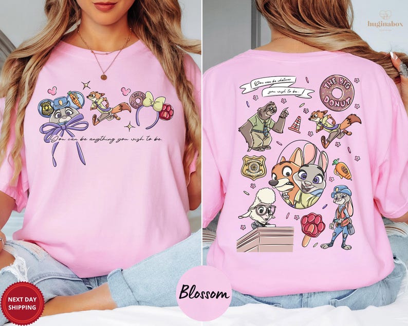 A woman wearing a pink t-shirt with a cartoon character design on the front and a back view of the same design.
