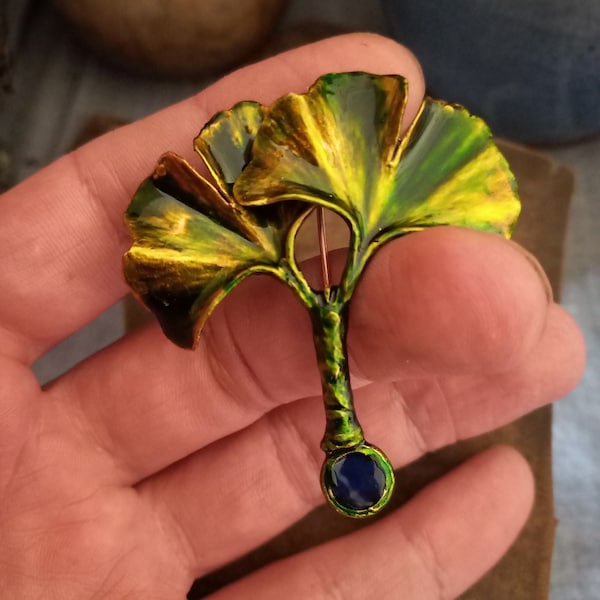 Green enamel ginkgo leaf brooch with cobalt blue glass insert