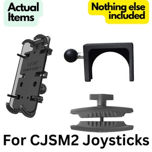 May include: A black phone mount with a RAM Quick-Grip logo, a black ball joint arm, a black clamp with a screw, and a black clamp with a knob. The text "For CJSM2 Joysticks" is written below the image. The text "Nothing else included" is written in yellow on a black rectangle at the top of the image.