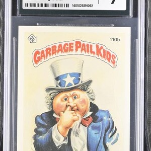 1986 Garbage Pail Kids Series 3 U.S. Arnie CGC 9.0 Mint Wanted: Big Sister