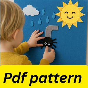 May include: A blue felt board with a smiling yellow sun, white cloud, and blue raindrops. A child is holding a black spider with white eyes. The text "Pdf pattern" is at the bottom of the image.