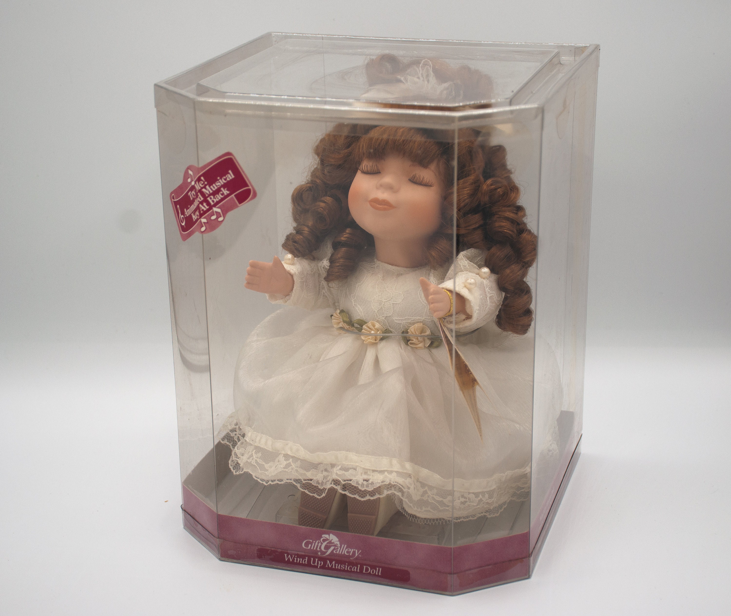 Animated wind cheap up musical doll