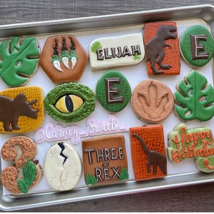 Three Rex birthday cookies