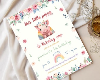 May include: A pink pig wearing a flower crown and rainbow wings is featured on a white invitation with floral accents. The text reads "This little piggy is turning one" and includes details for a birthday party.