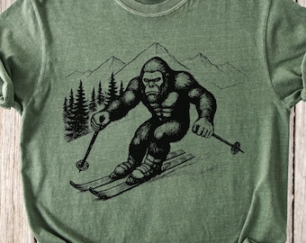 Skiing Bigfoot Shirt – Comfort Colors Funny Sasquatch Snow Sport Tee – Retro Mountain Graphic Gift for Skiers and Outdoorsy Folks
