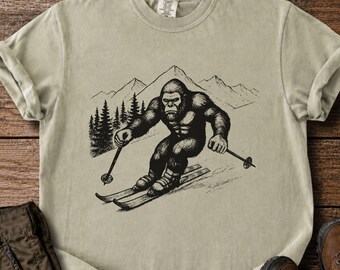 Skiing Bigfoot Shirt – Retro Sasquatch Snow Sport Tee – Mountain Graphic Gift for Skiers