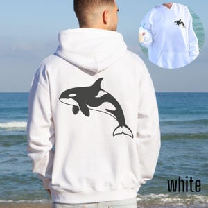 White hoodie with large black Orca design on back and small Orca design on front. Available in Hoodies, sweatshirt and shirts.