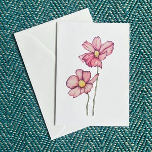 Carte de voeux marguerite rose dessinée à la main - Illustration florale vierge, art botanique charmant, papeterie nature faite main, parfaite pour les anniversaires