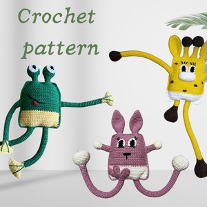 May include: Crochet pattern for three amigurumi toys: a green frog, a yellow giraffe, and a pink bunny. Each toy has a unique expression and long limbs.