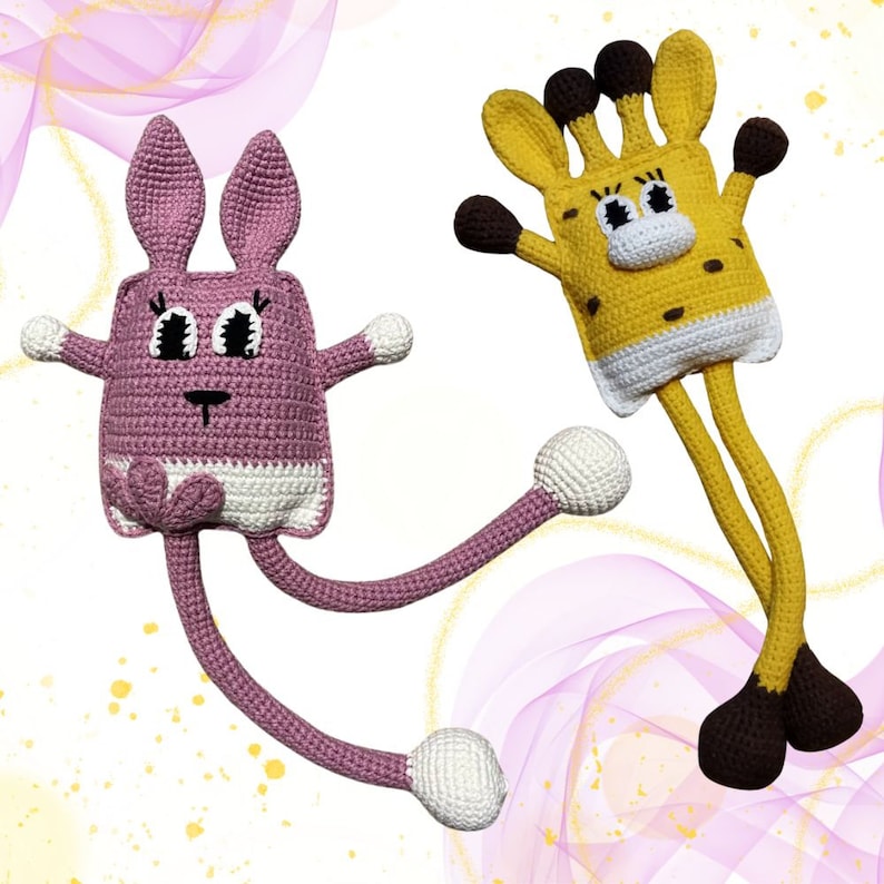 May include: Two crocheted stuffed animals, a pink bunny with long legs and a yellow giraffe with long legs. Both animals have black eyes and white accents.
