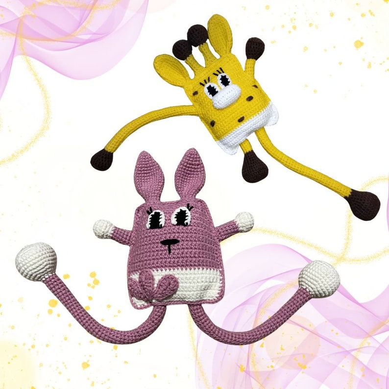 May include: Two crocheted stuffed animals, a pink rabbit with long legs and a yellow giraffe with a long neck. Both animals have large eyes and a friendly expression.