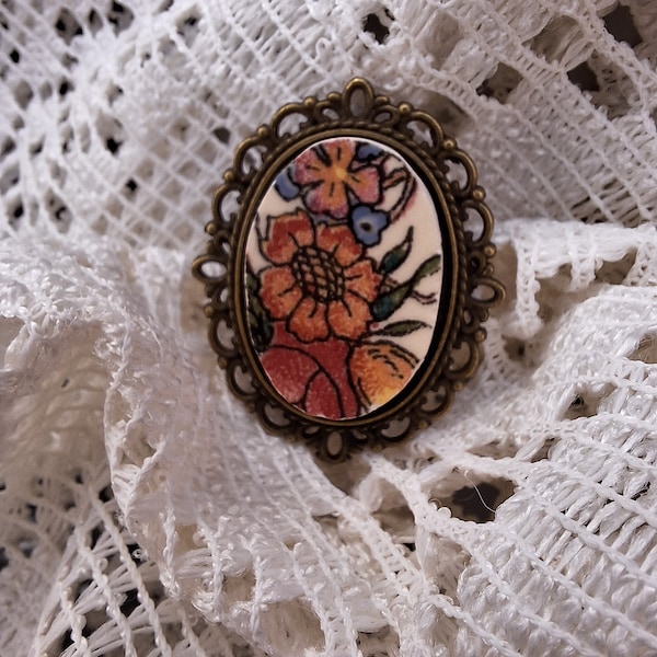 broche vintage en porcelaine cassés