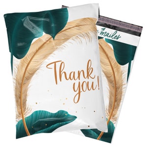 May include: White poly mailer with a tropical leaf and gold feather design. The mailer has the text "Thank you!" printed on the front.