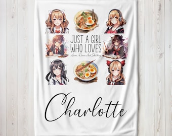 May include: White fleece blanket with a colorful illustration of anime characters and bowls of ramen. The text "Just a girl who loves Anime, Ramen and Sketching" is printed on the blanket. The name "Charlotte" is printed at the bottom of the blanket.
