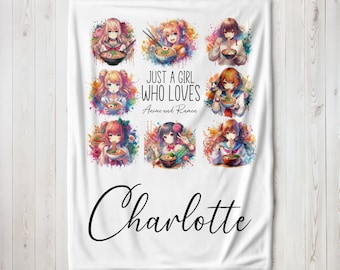 May include: White fleece blanket with a colorful design featuring anime characters eating ramen. The text "Just a girl who loves Anime and Ramen" and the name "Charlotte" are printed on the blanket.