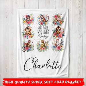 May include: White fleece blanket with a colorful monkey design and the text "Just a girl who loves monkeys" and the name "Charlotte".