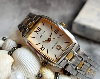 Orologio vintage Orient Tank, orologio da donna rettangolare bicolore oro e argento, orologio elegante al quarzo giapponese, orologio con quadrante in perle e numeri romani