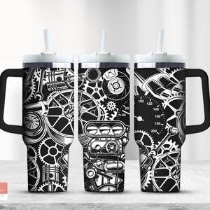 May include: Black and white stainless steel tumbler with a handle and a straw. The tumbler features a design of gears, an engine, and a speedometer.