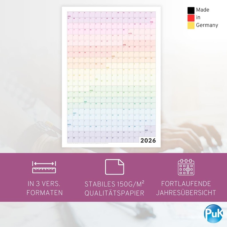 May include: A large, colorful 2026 wall calendar with a rainbow gradient design. The calendar is divided into monthly grids with dates and days. The text "Made in Germany" is visible in the upper right corner. Additional text includes "IN 3 VERS. FORMATEN", "STABILES 150G/M&sup2; QUALIT&Auml;TSPAPIER", and "FORTLAUFENDE JAHRES&Uuml;BERSICHT".