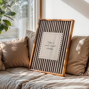 Cozy cottage powder room art print with vintage stripe design and warm neutral color palette
