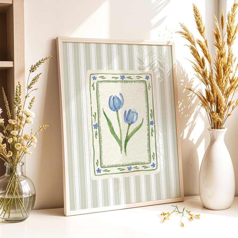 Quiet luxury botanical art print of blue tulips in watercolor style, bordered with scalloped green and blue flowers on soft linen stripe backdrop