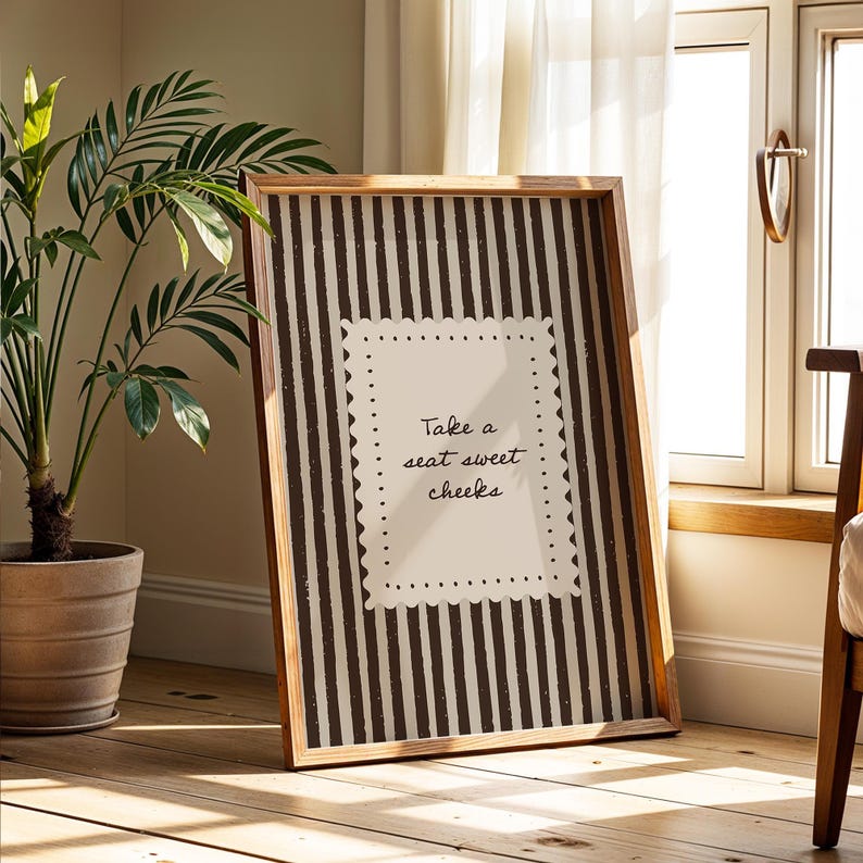 Neutral farmhouse bathroom printable with chocolate brown stripe background and playful powder room quote