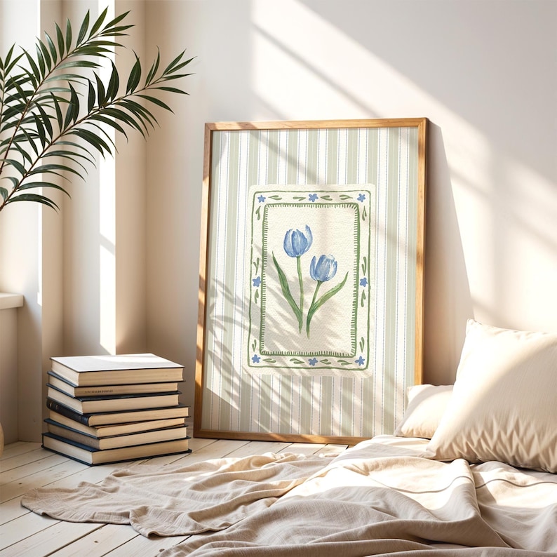 Blue tulip flower artwork with hand-painted botanical detail, set against soft green vintage stripes and bordered by floral motifs, printable wall art