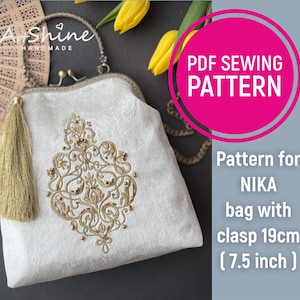 May include: A white velvet bag with a gold tassel and an embroidered design. The bag has a clasp closure and is 7.5 inches wide. PDF sewing pattern for NIKA bag.