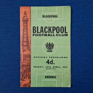May include: Black and white programme for a Blackpool Football Club game against Arsenal on Friday, 16th April, 1965. The programme costs 4d. and features a picture of the Blackpool Tower.
