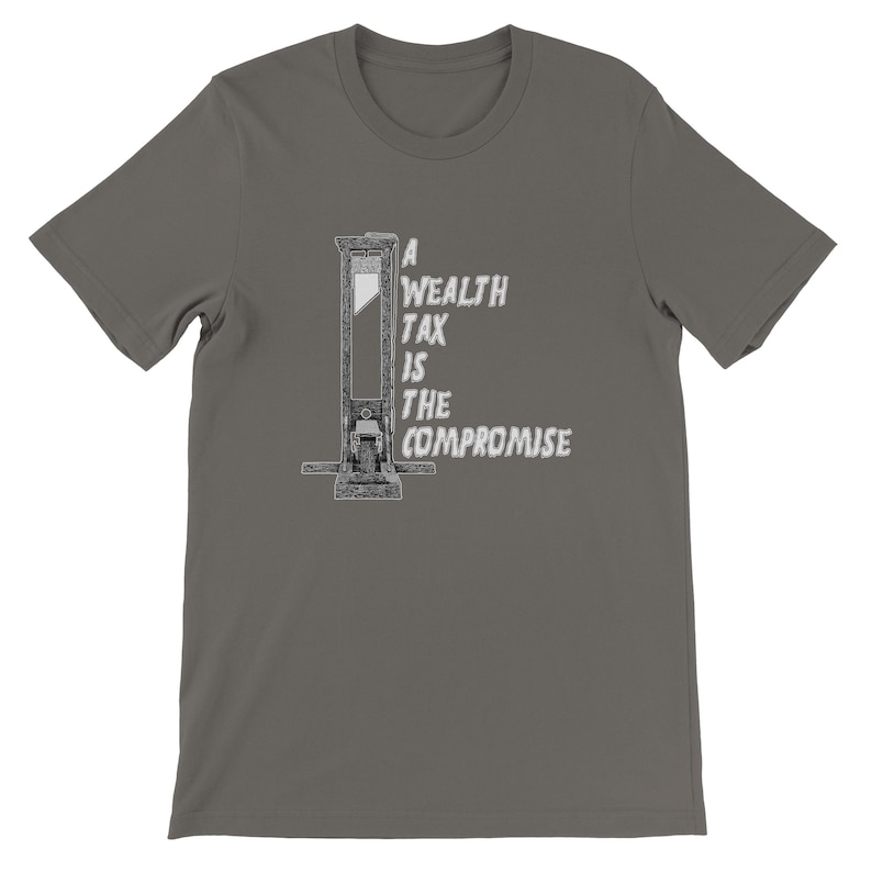 May include: A gray t-shirt featuring a guillotine illustration with the text "A Wealth Tax Is The Compromise" in white. The graphic is centered on the front of the shirt. The shirt has short sleeves and a crew neck.
