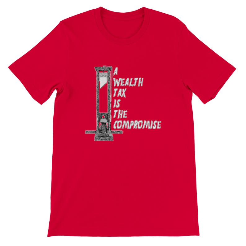 May include: A red t-shirt featuring a graphic of a guillotine with the text "A WEALTH TAX IS THE COMPROMISE" in white. The design is centered on the front of the shirt.