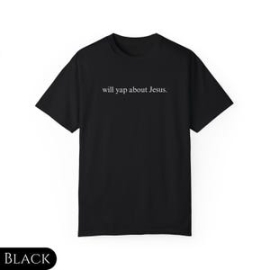 May include: Black t-shirt with the text "will yap about Jesus." printed in white.